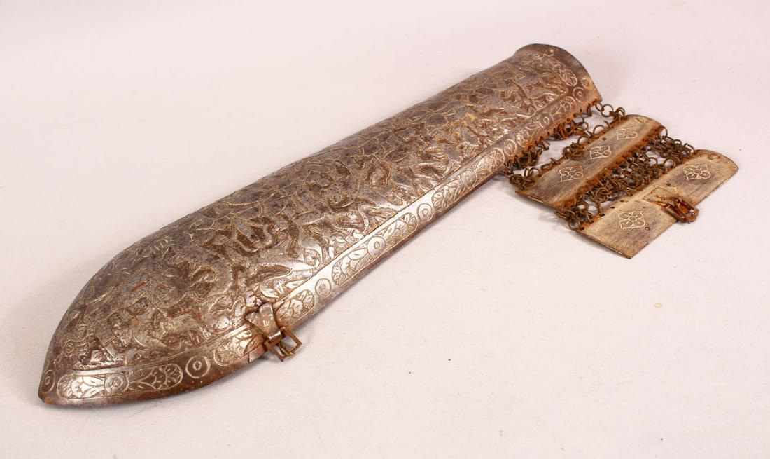 A 19TH CENTURY PERSIAN QAJAR STEEL ARM GUARD, 34cm: A 19TH CENTURY PERSIAN QAJAR STEEL ARM GUARD, 34cm long.