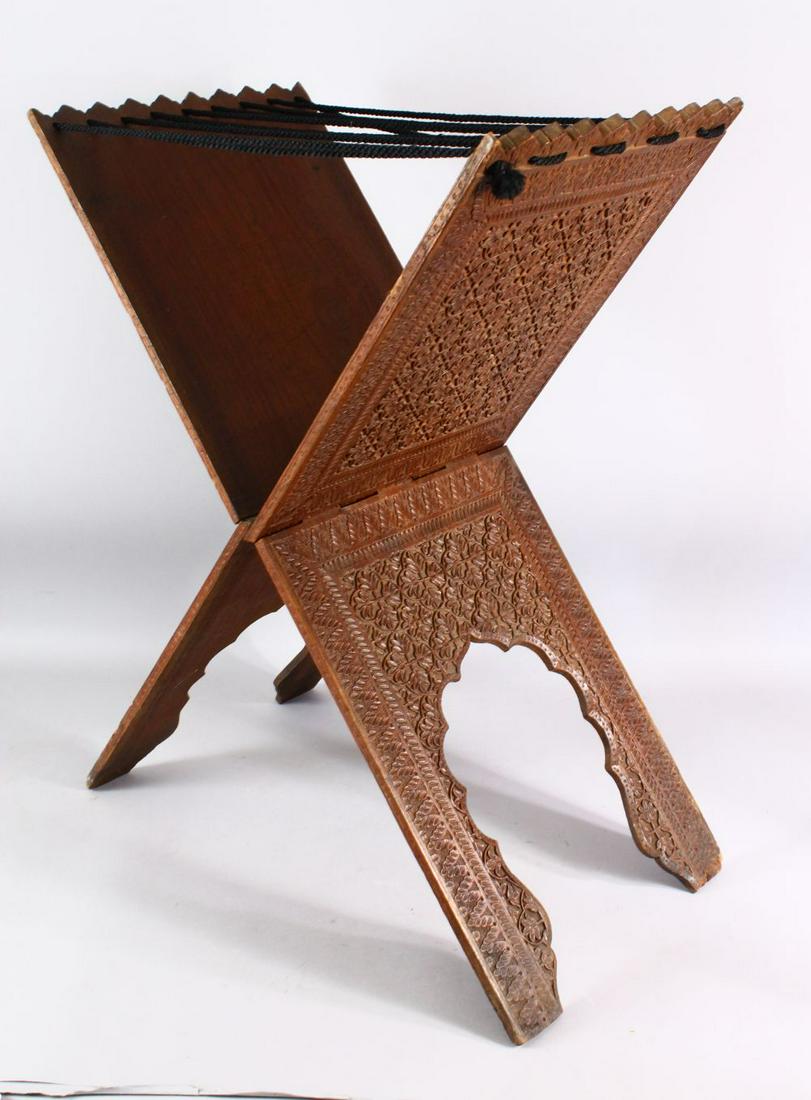 AN ISLAMIC CARVED WOODEN QURAN STAND - carved profusely (1 of 1)