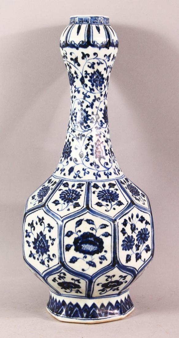 A CHINESE BLUE & WHITE PORCELAIN GARLIC HEAD VASE,: A CHINESE BLUE & WHITE PORCELAIN GARLIC HEAD VASE, decorated with panels of lotus, the base with an incised seal mark, 36cm high.