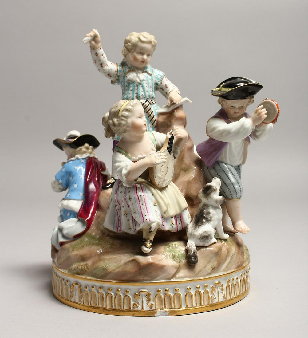 A SUPERB 19TH CENTURY MEISSEN CIRCULAR GROUP OF FIVE: A SUPERB 19TH CENTURY MEISSEN CIRCULAR GROUP OF FIVE CHILDREN on a rock with a dog, depicting music on a circular rocky base. Cross swords mark in blue,incised 1324. 7ins high.