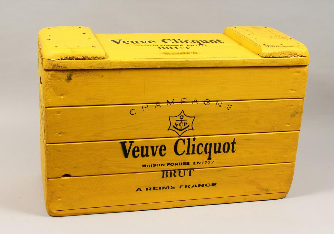 A YELLOW PAINTED WOODEN CHAMPAGNE CRATE "VUEVE: A YELLOW PAINTED WOODEN CHAMPAGNE CRATE "VUEVE CLIQUOT". 27.5ins long X 18 ins high
