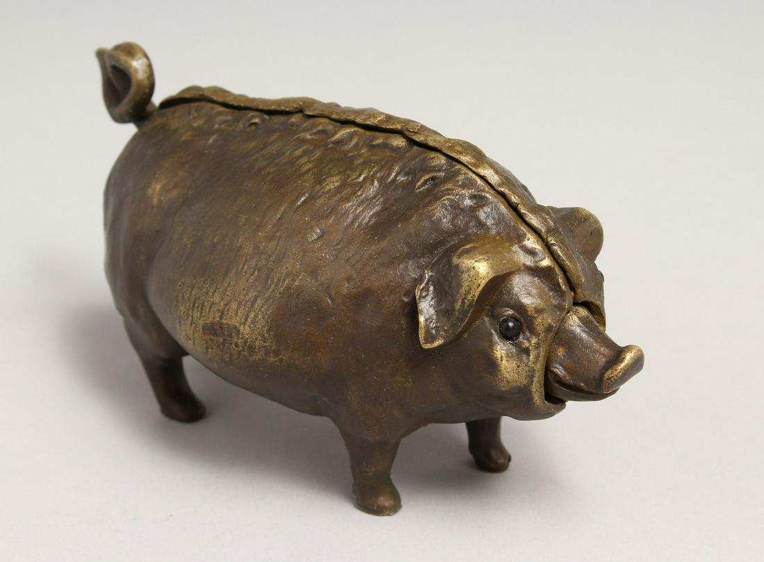 A BRONZE BOAR DESK BELL. 6ins long: A BRONZE BOAR DESK BELL. 6ins long