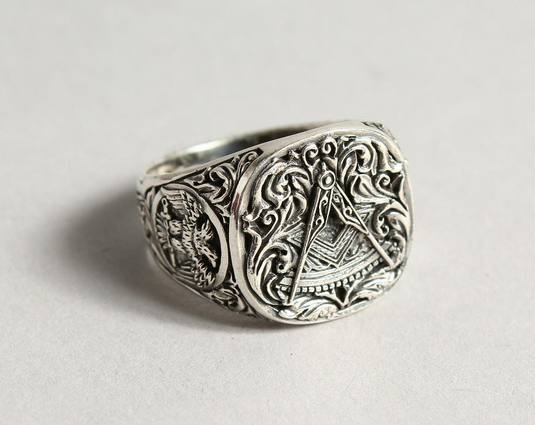 A SILVER MASONIC RING: A SILVER MASONIC RING