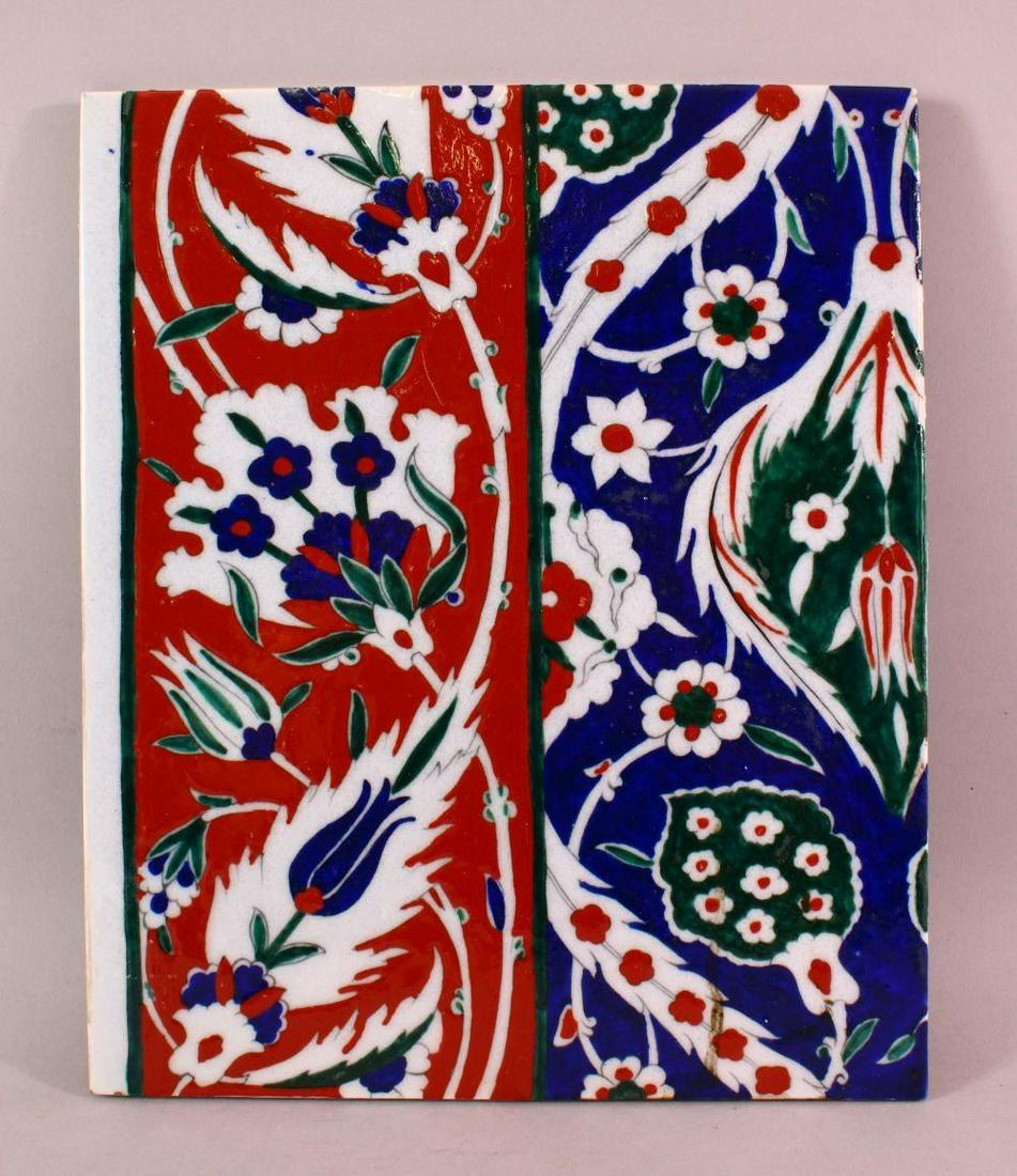 A TURKISH IZNIK STYLE POTTERY TILE SECTION, with floral: A TURKISH IZNIK STYLE POTTERY TILE SECTION, with floral decoration, 33cm x 27cm