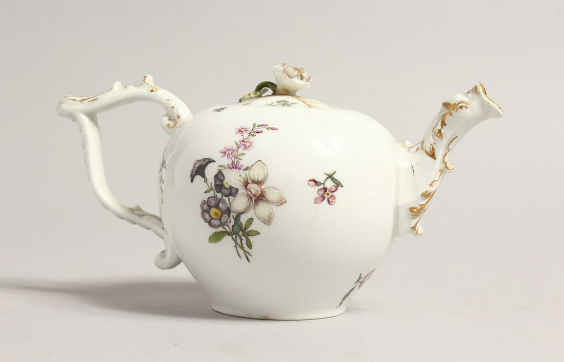 A 19TH CENTURY MEISSEN BULLET SHAPED TEA POT, (lid A: A 19TH CENTURY MEISSEN BULLET SHAPED TEA POT, (lid A F), painted with flowers Cross swords mark in blue