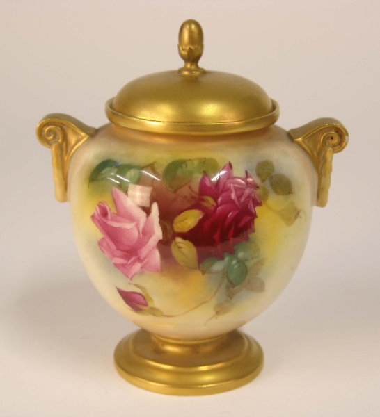 A ROYAL WORCESTER TWO HANDLED POT AND COVER painte