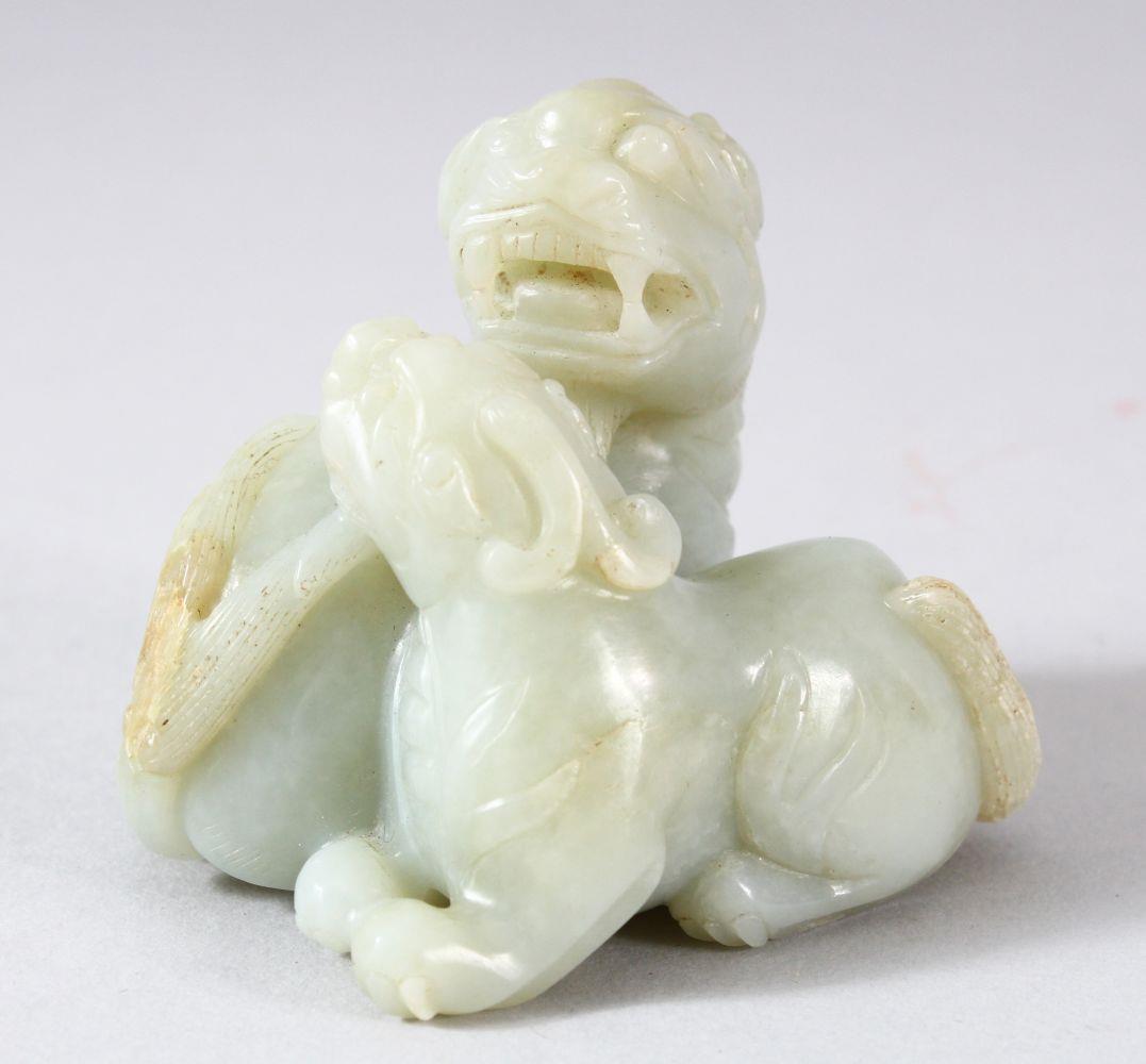A GOOD CHINESE CARVED JADE FIGURE OF TWO FOO DOGS, (1 of 5)