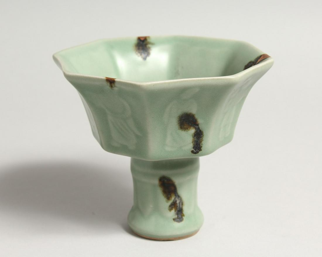 A CHINESE GREEN STEM CUP octagonal on a circular base.: A CHINESE GREEN STEM CUP octagonal on a circular base.
