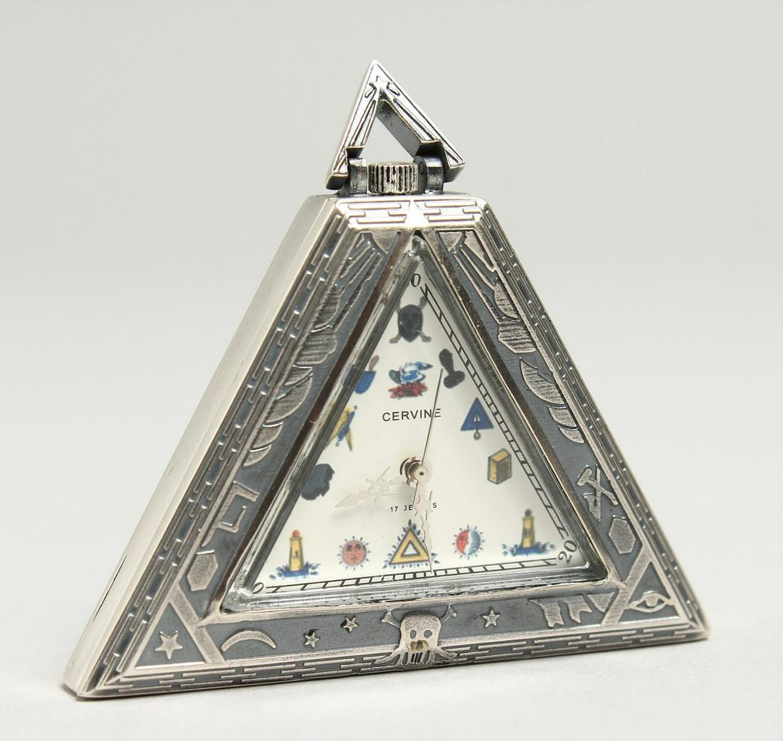 A SILVERED MASONIC TRIANGULAR WATCH 'CERVNE'.: A SILVERED MASONIC TRIANGULAR WATCH 'CERVNE'.