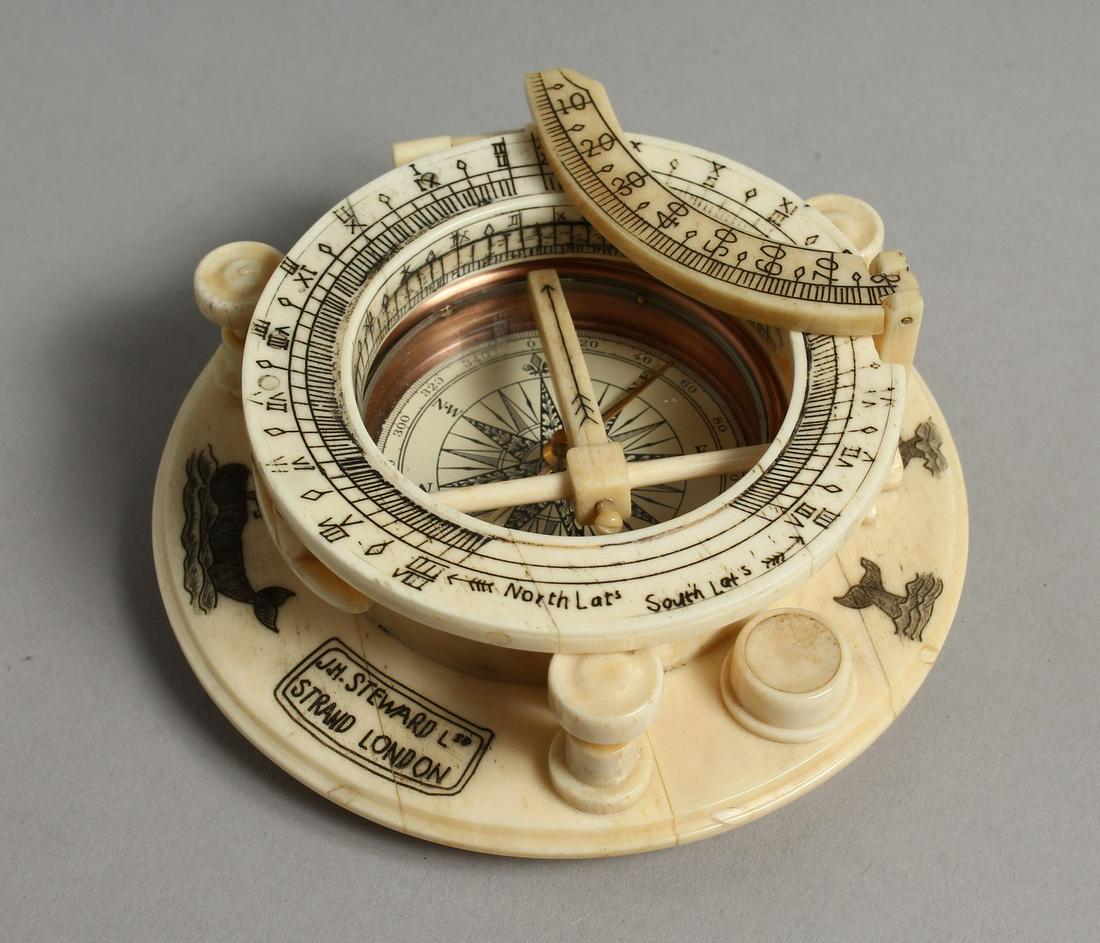AN ETCHED CIRCULAR BONE COMPASS 4ins diameter.: AN ETCHED CIRCULAR BONE COMPASS 4ins diameter.