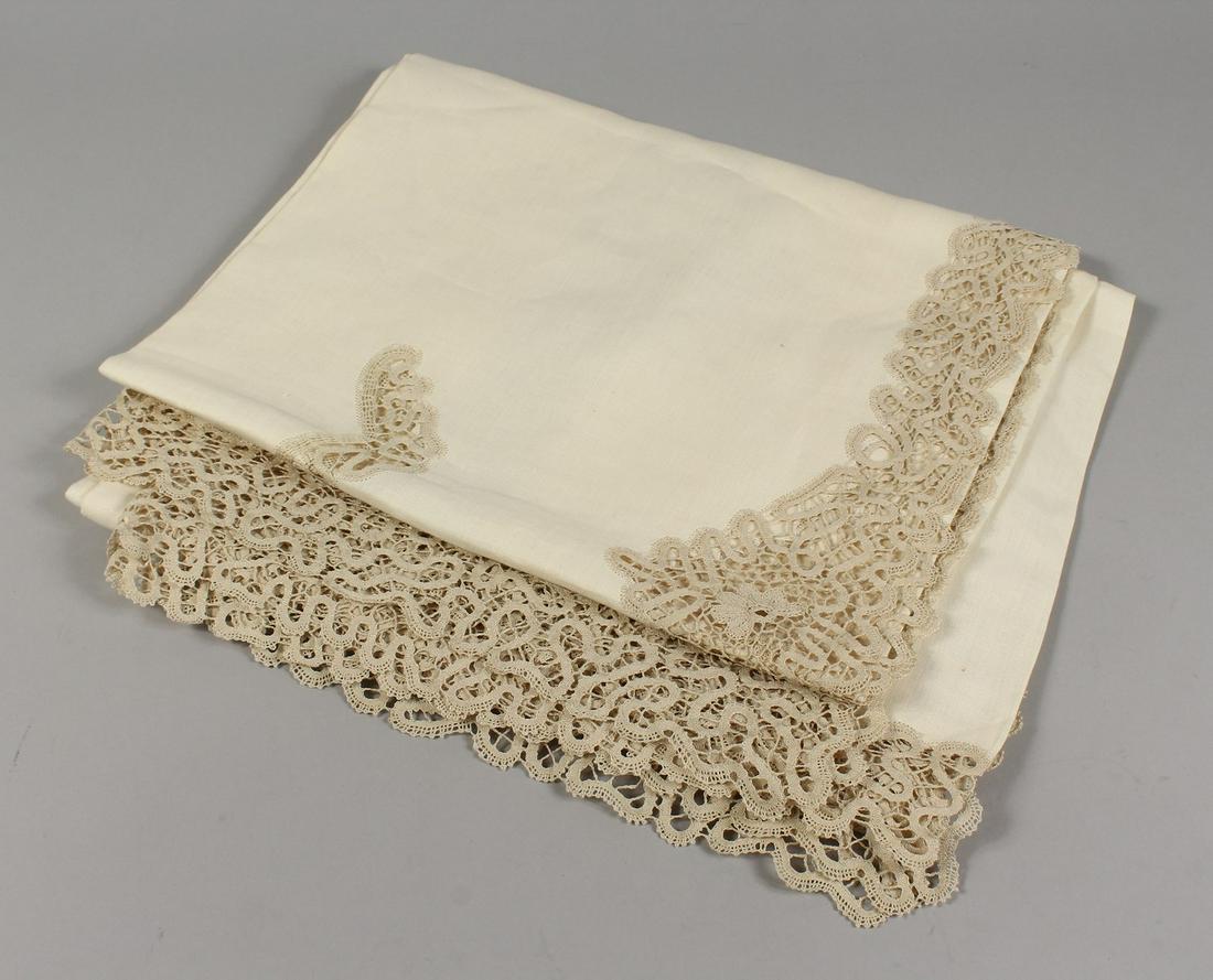 A MADEIRA LINEN TABLE CLOTH. 9ft 6ins x 5ft 3ins.: A MADEIRA LINEN TABLE CLOTH. 9ft 6ins x 5ft 3ins.