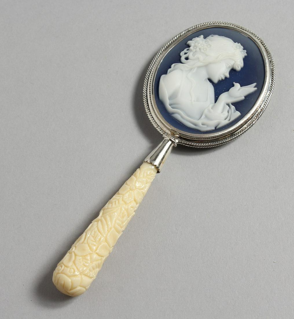 A SILVER CAMEO HAND MIRROR.: A SILVER CAMEO HAND MIRROR.