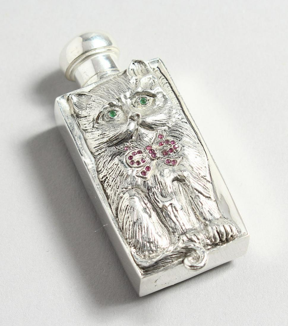 AN .800 RUBY AND EMERALD SET CAT PERFUME BOTTLE.: AN .800 RUBY AND EMERALD SET CAT PERFUME BOTTLE.