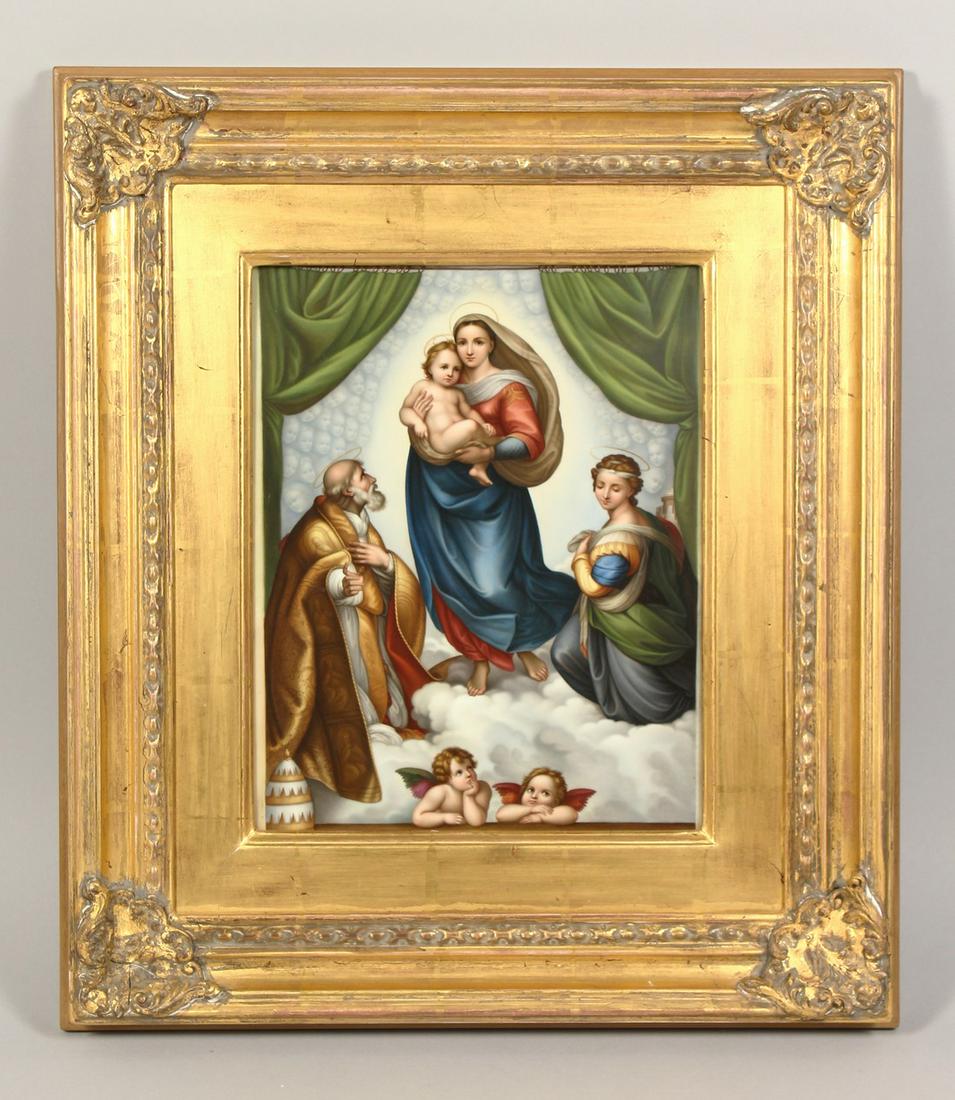 A FRAMED PORCELAIN PLAQUE.  Madonna and child.  12ins x (1 of 4)