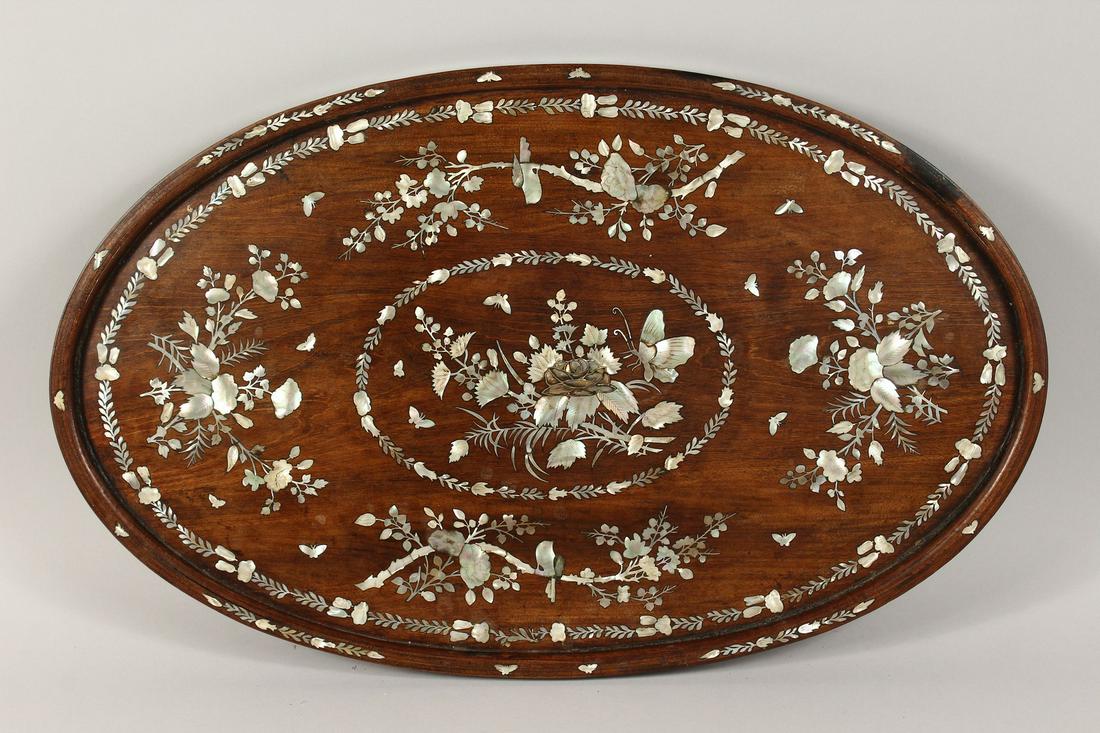 A CHINESE OVAL ROSEWOOD TRAY inlaid with mother of (1 of 7)