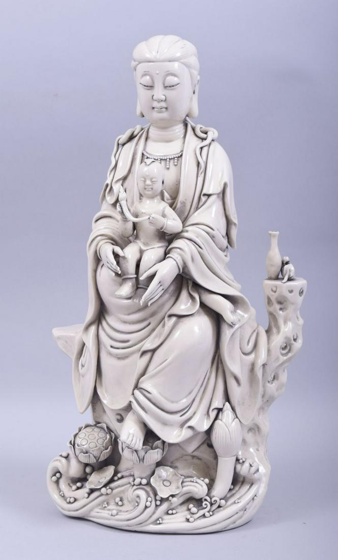 A LARGE CHINESE DEHUA PORCELAIN GUANYIN AND CHILD, (1 of 9)