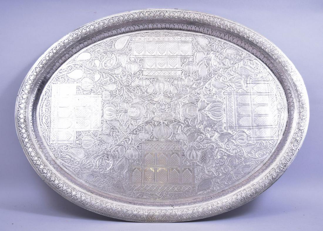 A LARGE INDIAN KASHMIRI ENGRAVED SERVING DISH, with (1 of 7)