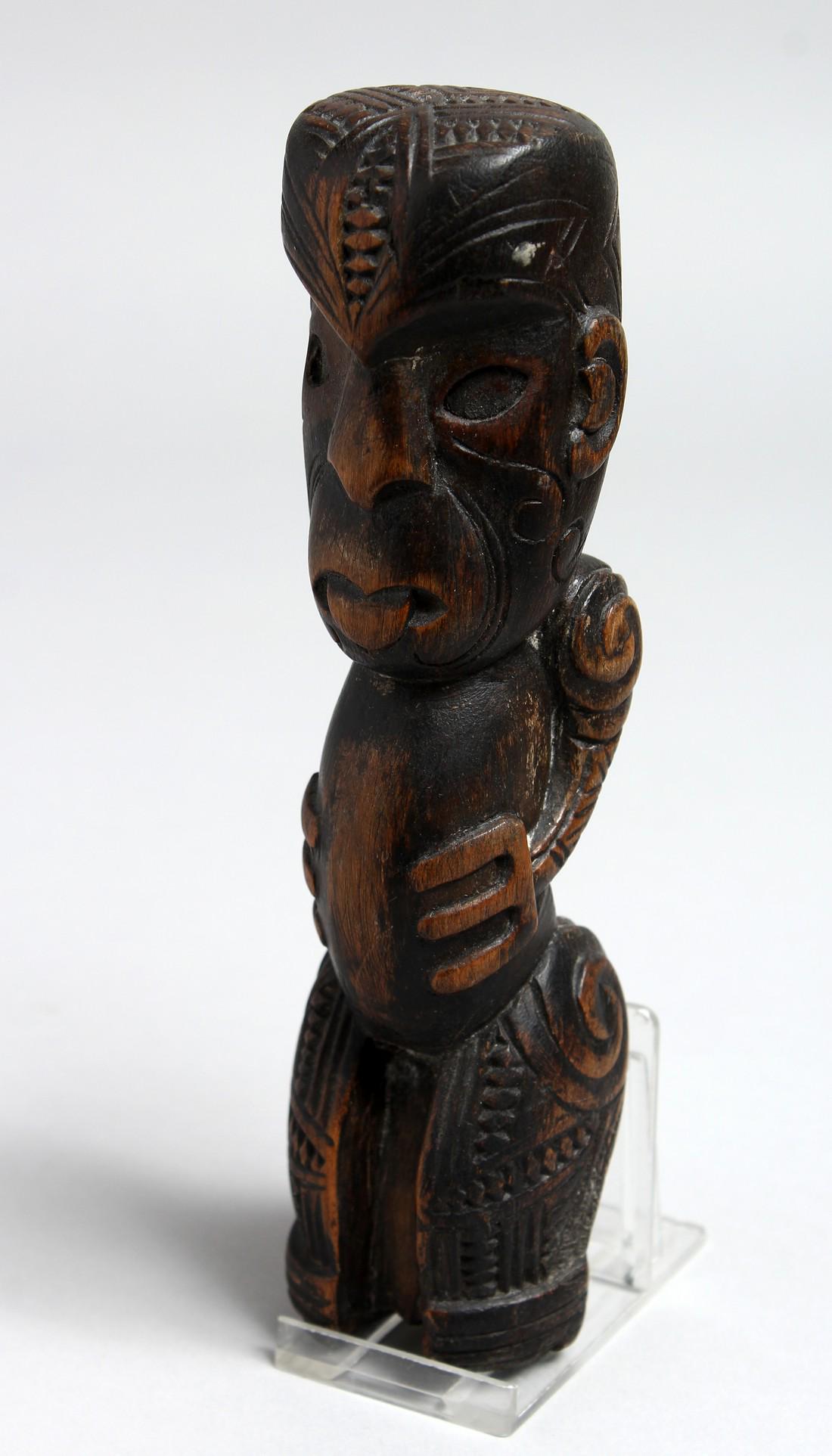 A MAORI CARVING. 7.5ins long.: A MAORI CARVING. 7.5ins long.