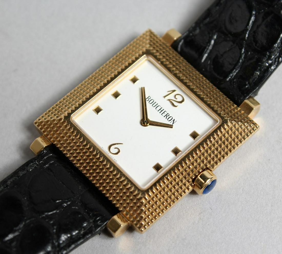 A GOOD 18CT WHITE GOLD BOUCHERON WATCH with leather strap, no. A1 402 784.: A GOOD 18CT WHITE GOLD BOUCHERON WATCH with leather strap, no. A1 402 784.
