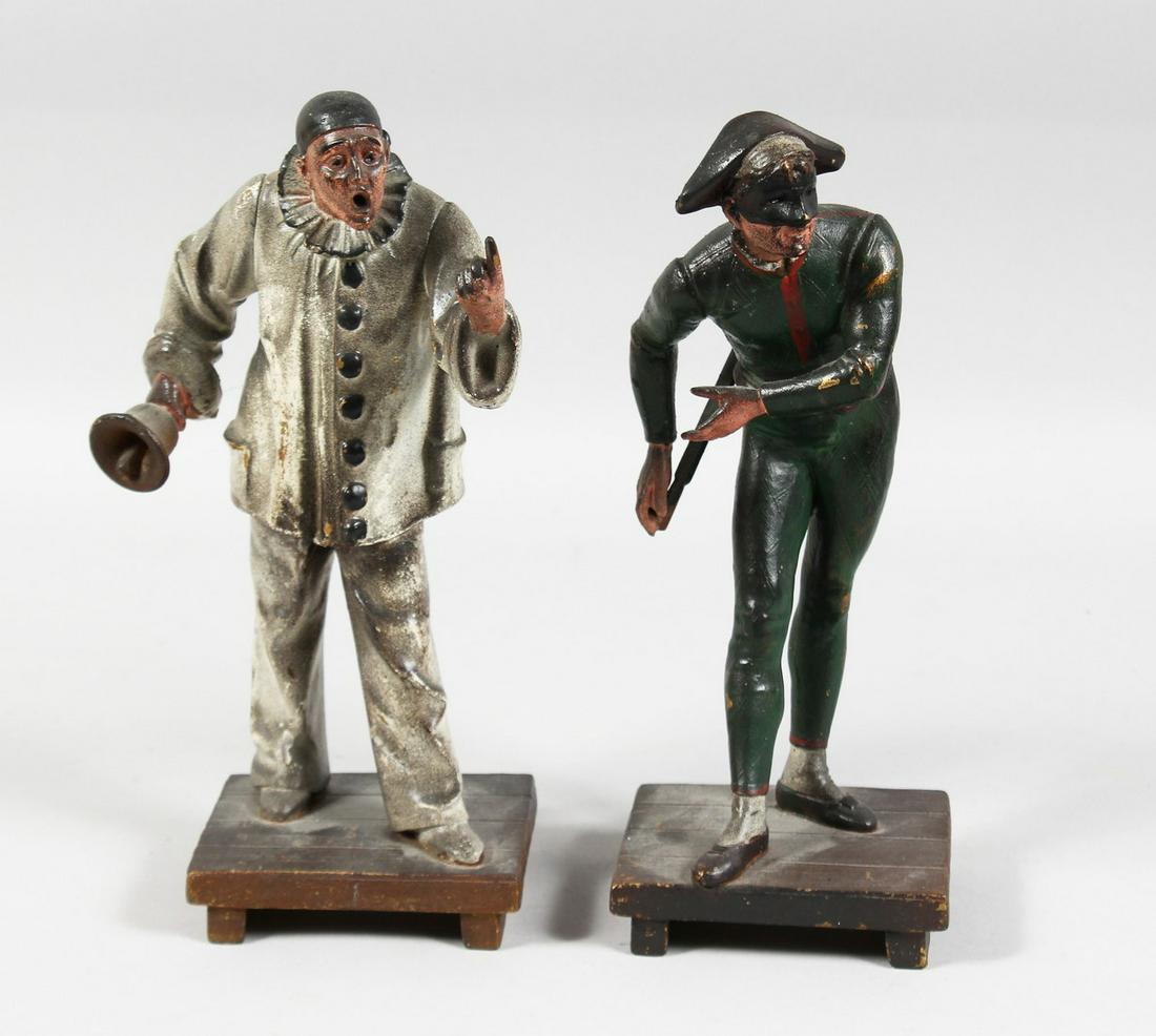 A PAINTED AUSTRIAN CLOWN with a hand bell, 10ins high and one of PIERROT 10ins high. (2). (1 of 11)
