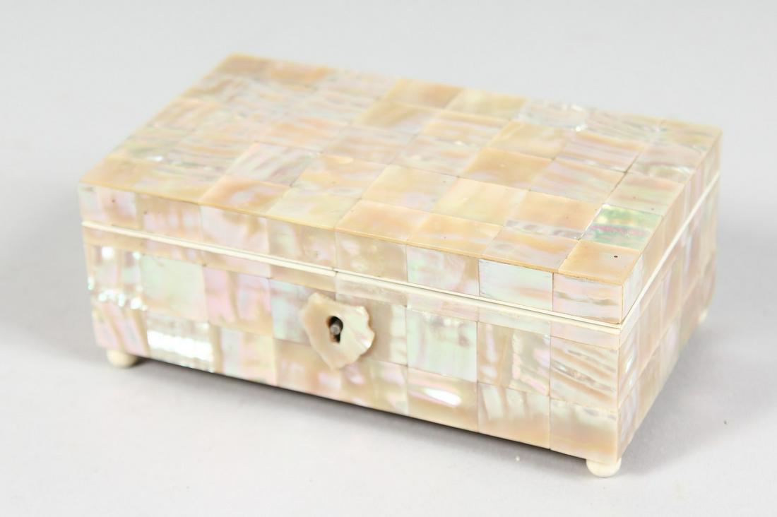 A SMALL SHELL CLAD SILK LINED, JEWELLERY BOX on ball feet.  4.5ins x 2.5ins. (1 of 7)