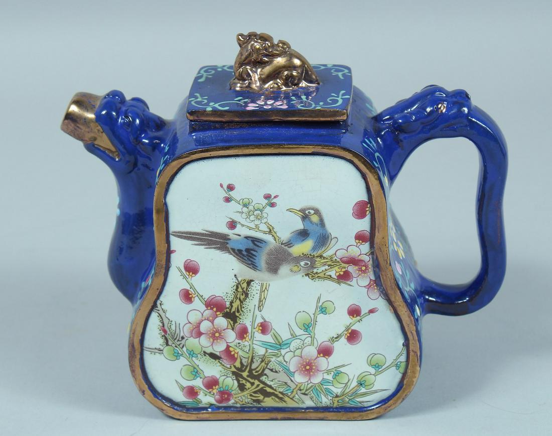 A FAMILLE ROSE YIXING ENAMEL TEA POT decorated with birds and flowers 4.5ins high.: A FAMILLE ROSE YIXING ENAMEL TEA POT decorated with birds and flowers 4.5ins high.