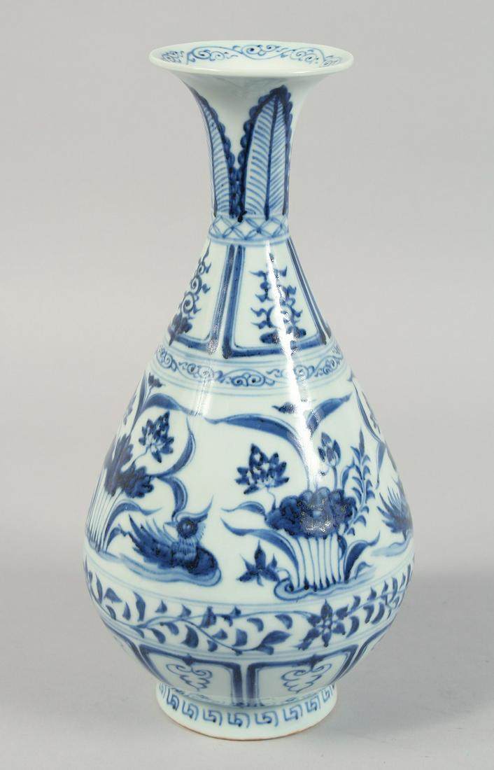 A CHINESE BLUE AND WHITE PORCELAIN VASE, the body painted with ducks and aquatic flora, 31cm high.: A CHINESE BLUE AND WHITE PORCELAIN VASE, the body painted with ducks and aquatic flora, 31cm high.