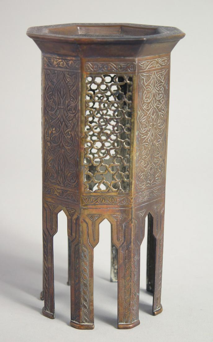 A FINE 19TH CENTURY ISLAMIC MINIATURE BRASS TABLE, the sides with panels of engraved and openwork (1 of 6)