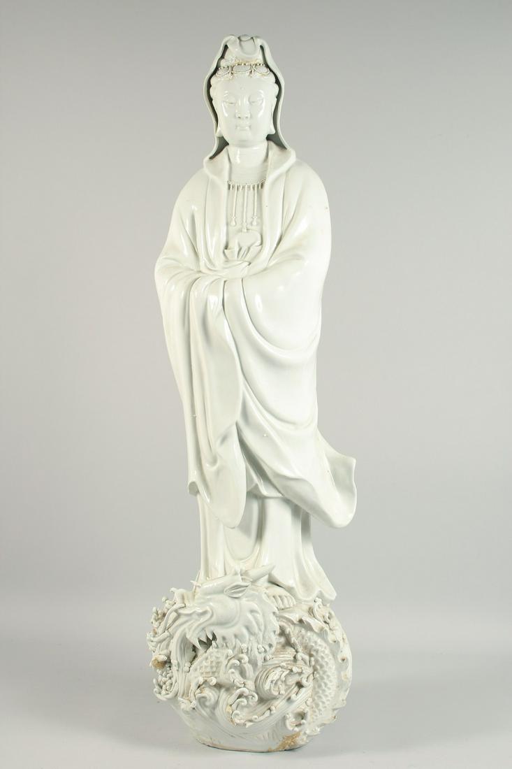 A LARGE CHINESE WHITE PORCELAIN STANDING GUANYIN FIGURE. 3ft high.: A LARGE CHINESE WHITE PORCELAIN STANDING GUANYIN FIGURE. 3ft high.