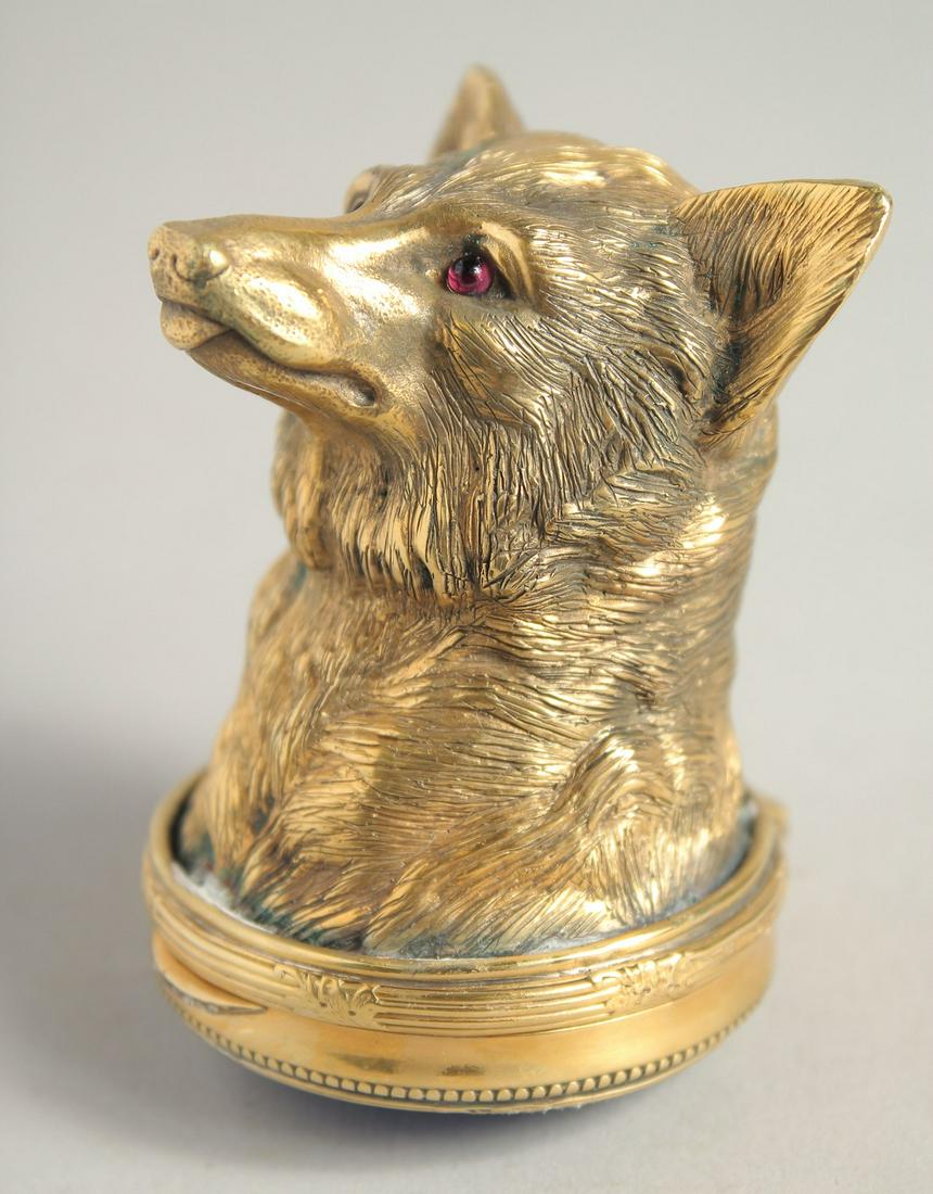A GOOD RUSSIAN SILVER GILT DOG'S HEAD SNUFF BOX, 2.5ins long with blue enamel and diamond base.: A GOOD RUSSIAN SILVER GILT DOG'S HEAD SNUFF BOX, 2.5ins long with blue enamel and diamond base. Mark I.P., Head 84 in a Faberge box.