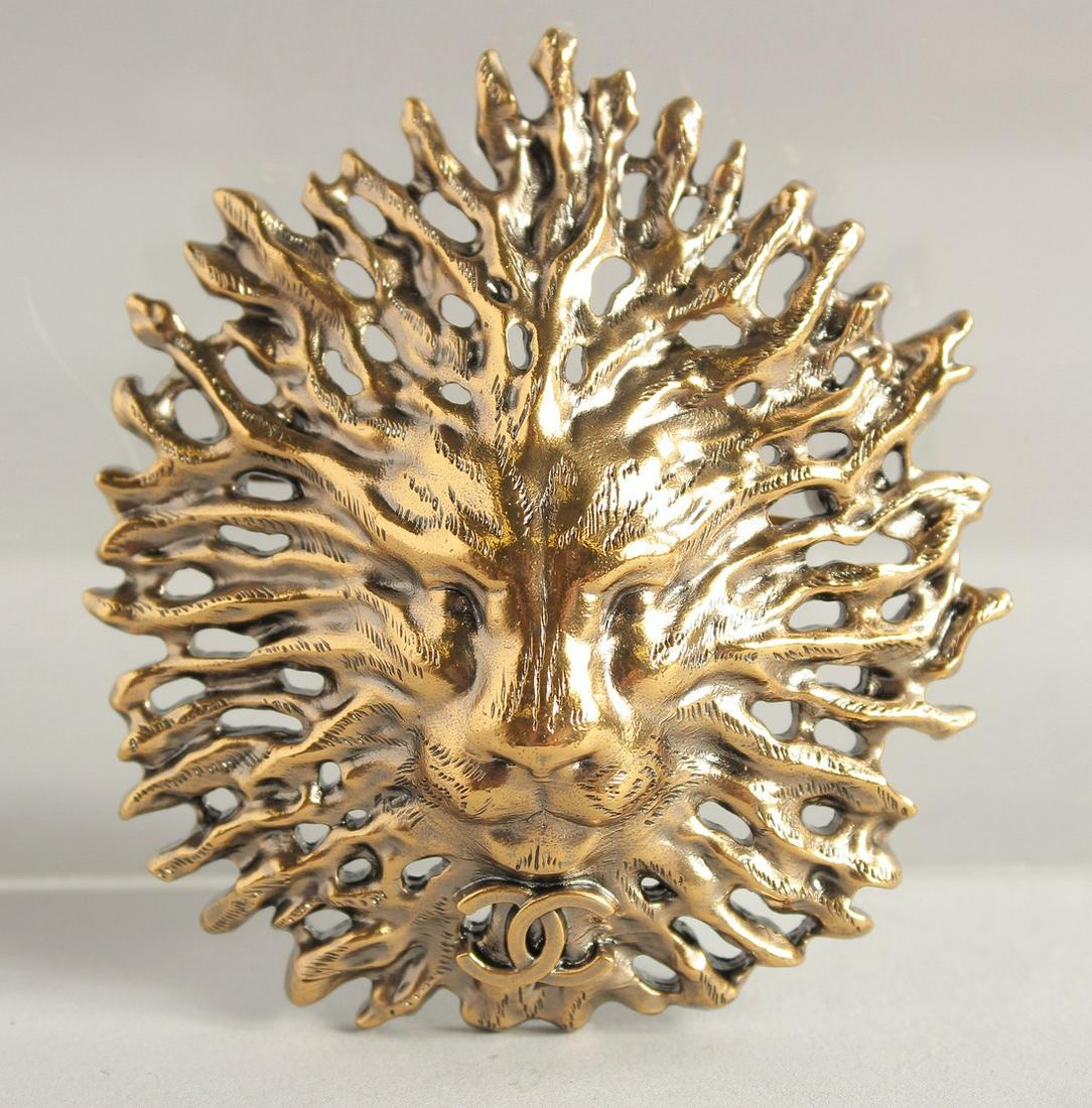 Chanel sale lion brooch