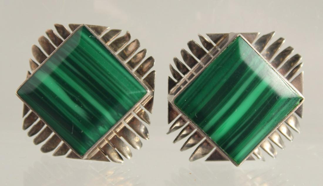 A PAIR OF SILVER AND MALACHITE EAR CLIPS: A PAIR OF SILVER AND MALACHITE EAR CLIPS