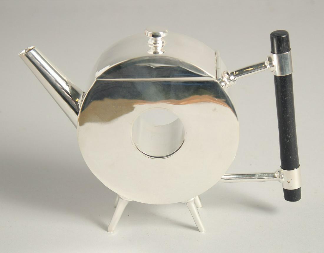 A POLO MINT SHAPE CHRISTOPHER DRESSER DESIGN SILVER PLATED TEA POT. 5.5ins high.: A POLO MINT SHAPE CHRISTOPHER DRESSER DESIGN SILVER PLATED TEA POT. 5.5ins high.