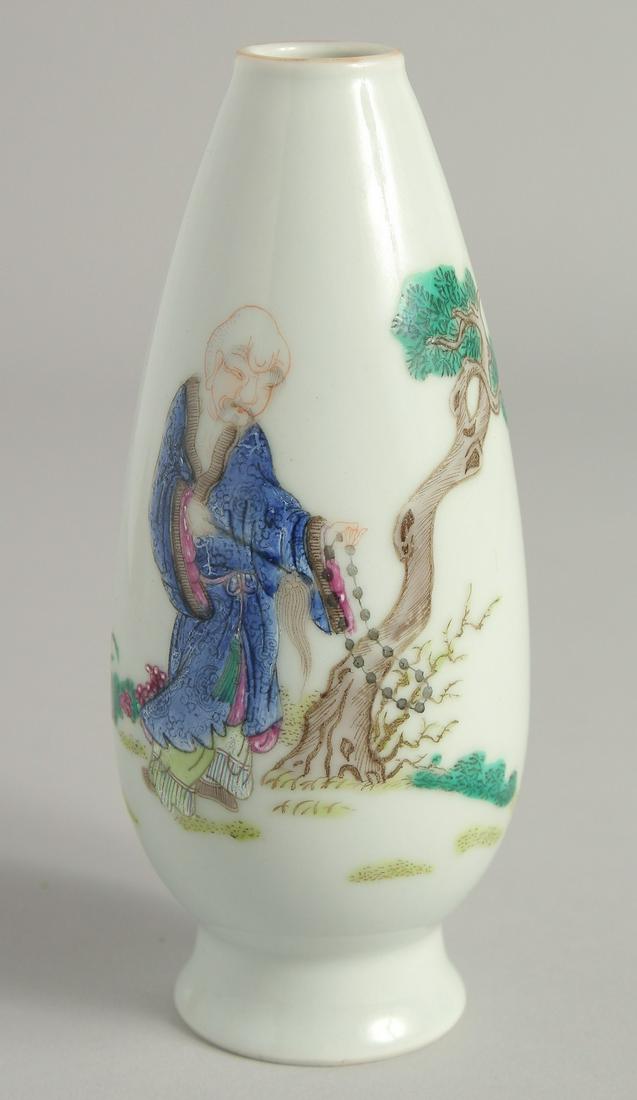 A SMALL CHINESE FAMILLE ROSE PORCELAIN VASE, painted with a sage holding a string of beads beside a: A SMALL CHINESE FAMILLE ROSE PORCELAIN VASE, painted with a sage holding a string of beads beside a tree, the base with Daoguang mark, 15cm high.