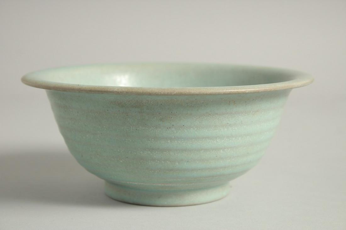 A CHINESE RUI WARE CELADON PORCELAIN BOWL. 18.cm diameter: A CHINESE RUI WARE CELADON PORCELAIN BOWL. 18.cm diameter