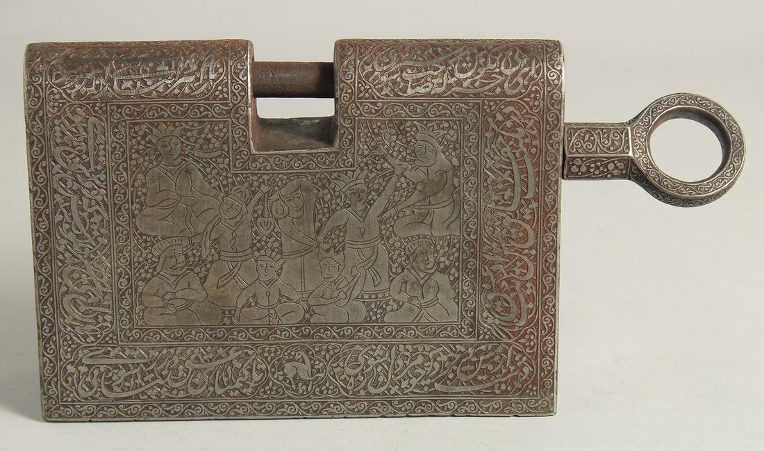 A LARGE ISLAMIC ENGRAVED STEEL LOCK, with bands of calligraphy and spring-operated locking system,: A LARGE ISLAMIC ENGRAVED STEEL LOCK, with bands of calligraphy and spring-operated locking system, 28cm wide