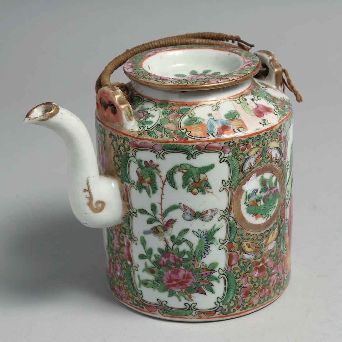 A CHINESE CANTON FAMILLE ROSE PORCELAIN TEAPOT, 13cm high.: A CHINESE CANTON FAMILLE ROSE PORCELAIN TEAPOT, 13cm high.