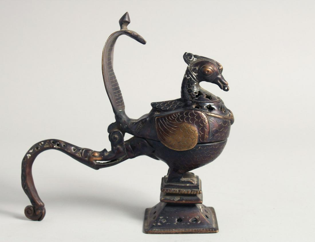 A 19TH CENTURY INDIAN DECCANI BRONZE HAMSA BIRD INCENSE BURNER, 21cm long.: A 19TH CENTURY INDIAN DECCANI BRONZE HAMSA BIRD INCENSE BURNER, 21cm long.