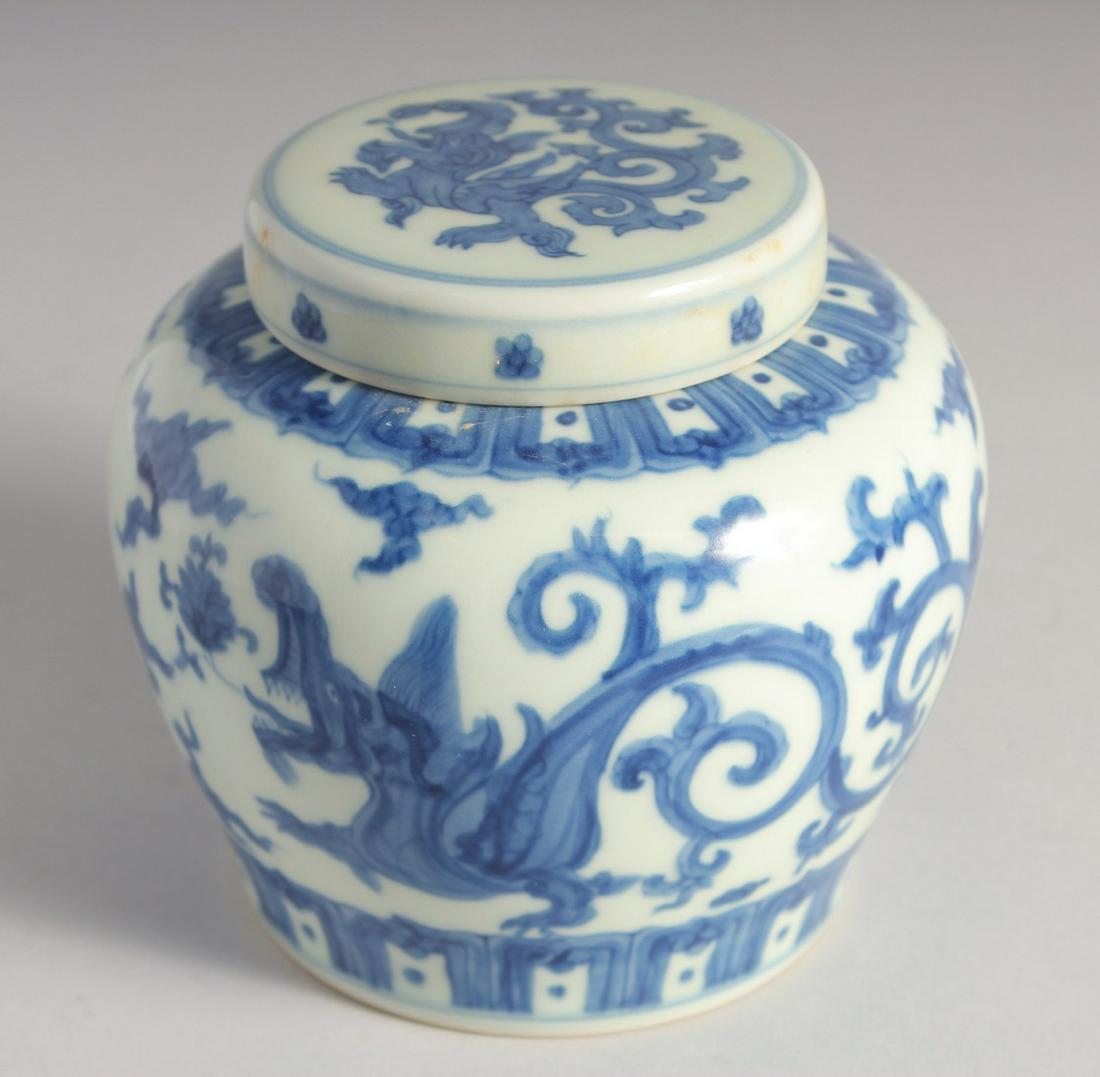 A CHINESE BLUE AND WHITE PORCELAIN GINGER JAR AND COVER decorated with kui dragon. 12cm high: A CHINESE BLUE AND WHITE PORCELAIN GINGER JAR AND COVER decorated with kui dragon. 12cm high