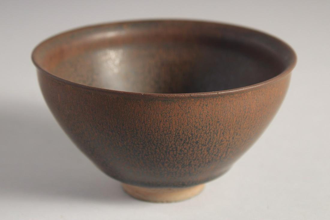 A CHINESE JIN WARE POTTERY BOWL, with hare's fur glaze, and carved characters to the base. 12.5cm (1 of 6)
