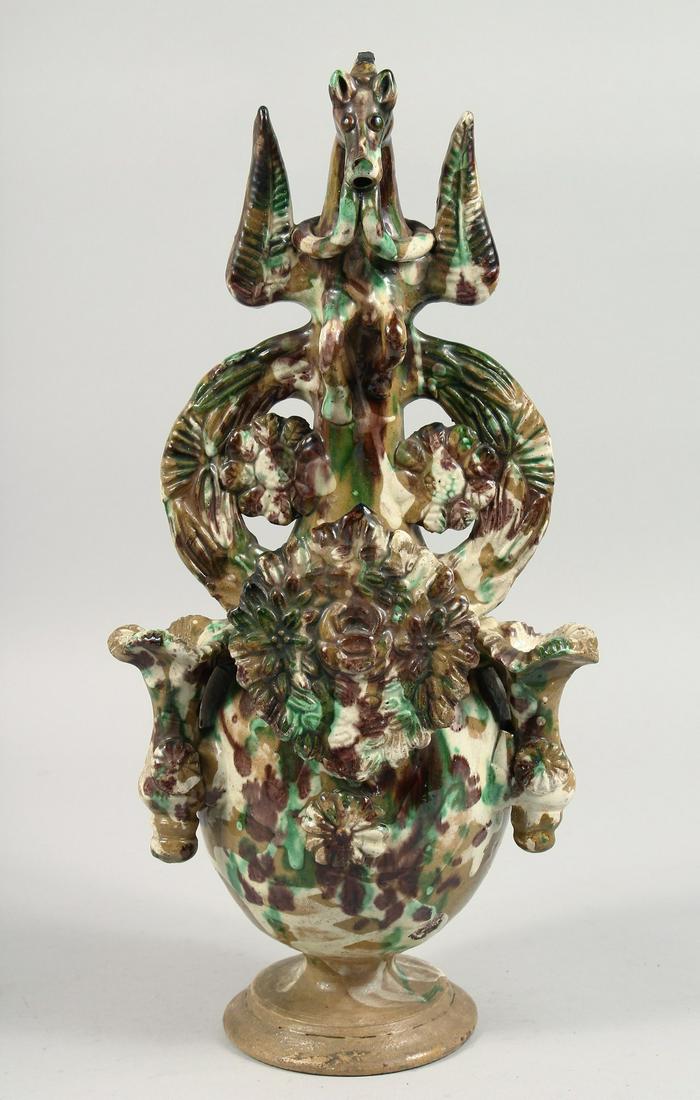 A RARE 19TH CENTURY TURKISH OTTOMAN CANAKKALE GLAZED POTTERY ZOOMORPHIC EWER, with large relief (1 of 7)