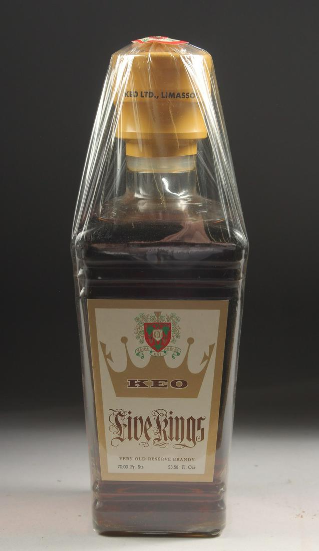 A BOTTLE OF FIVE KINGS VERY OLD RESERVE BRANDY. (1 of 3)