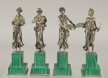 A SUPERB SET OF FOUR SILVER CLASSICAL FIGURES ON MALACHITE BASES.  Mark: head 84, Faberge mark.