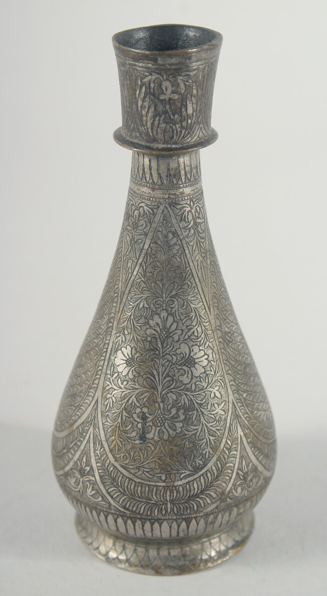 A SMALL ISLAMIC ENGRAVED METAL HUQQA BASE, with floral decoration, 15cm high.: A SMALL ISLAMIC ENGRAVED METAL HUQQA BASE, with floral decoration, 15cm high.