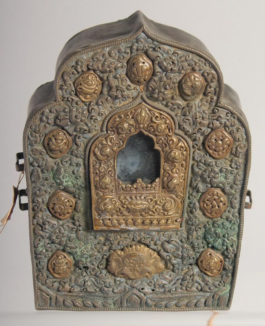 A TIBETAN BUDDHIST GHAU SHRINE BOX, with glass window inset, 15.5cm x 12cm.: A TIBETAN BUDDHIST GHAU SHRINE BOX, with glass window inset, 15.5cm x 12cm.