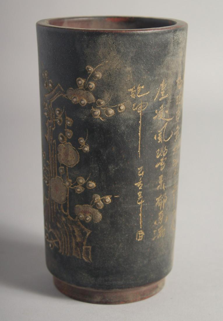 A CHINESE YIXING CYLINDRICAL BRUSH POT, with carved calligraphy, 15.5cm high.: A CHINESE YIXING CYLINDRICAL BRUSH POT, with carved calligraphy, 15.5cm high.