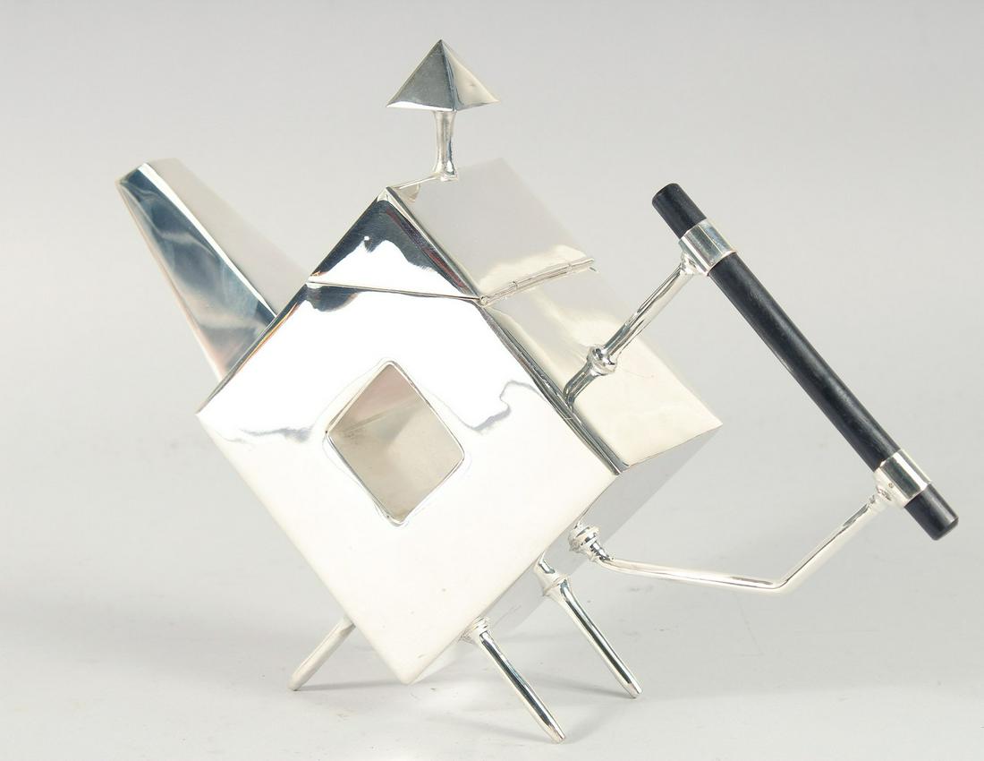 A CHRISTOPHER DRESSER DESIGN  SILVER PLATED SQUARE, WITH A HOLE, TEA POT. (1 of 1)