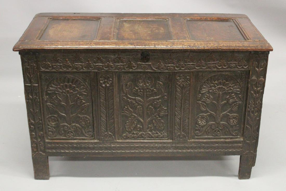 A GOOD 19TH CENTURY OAK DOWER CHEST with plain rising top, three carved panels to the front. 4ft: A GOOD 19TH CENTURY OAK DOWER CHEST with plain rising top, three carved panels to the front. 4ft 1ins long, 2ft deep, 2ft 6ins high.