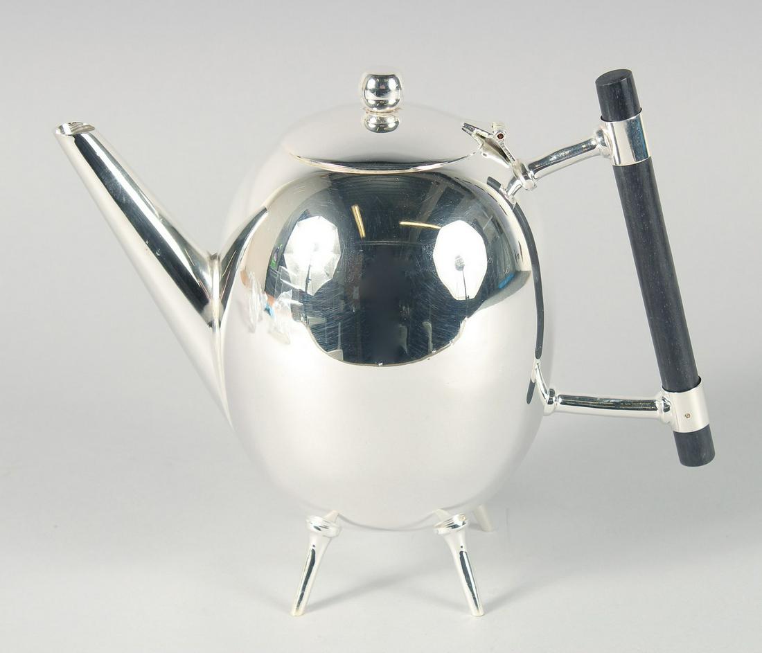 A GLOBULAR CHRISTOPHER DRESSER DESIGN SILVER PLATED CIRCULAR TEA POT. 7ins diameter.: A GLOBULAR CHRISTOPHER DRESSER DESIGN SILVER PLATED CIRCULAR TEA POT. 7ins diameter.