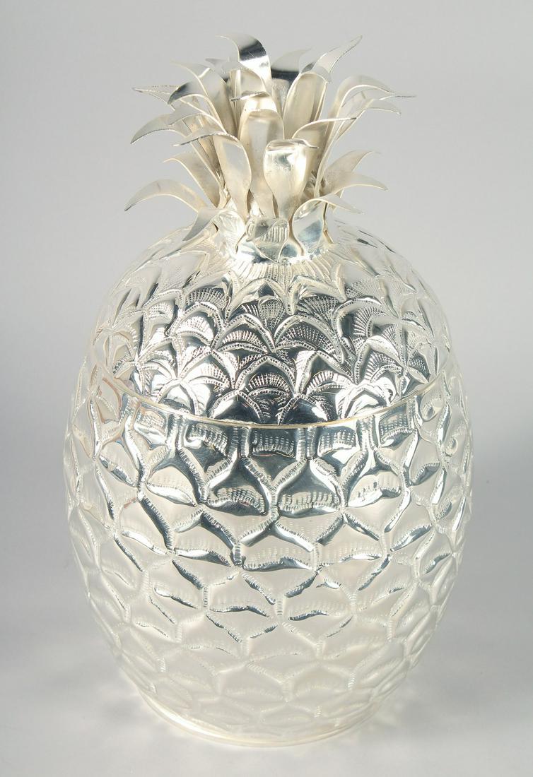 A SILVER PLATED PINEAPPLE ICE BUCKET. 13ins high.: A SILVER PLATED PINEAPPLE ICE BUCKET. 13ins high.